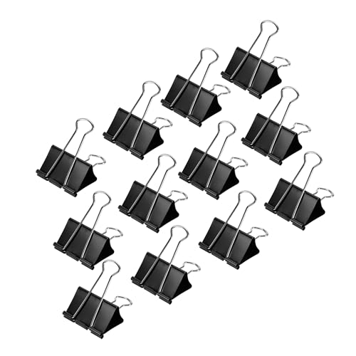Black binder clips arranged